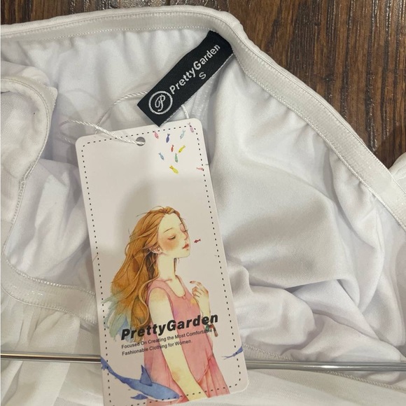 Elegant White Draped Dress - Picture 3 of 3